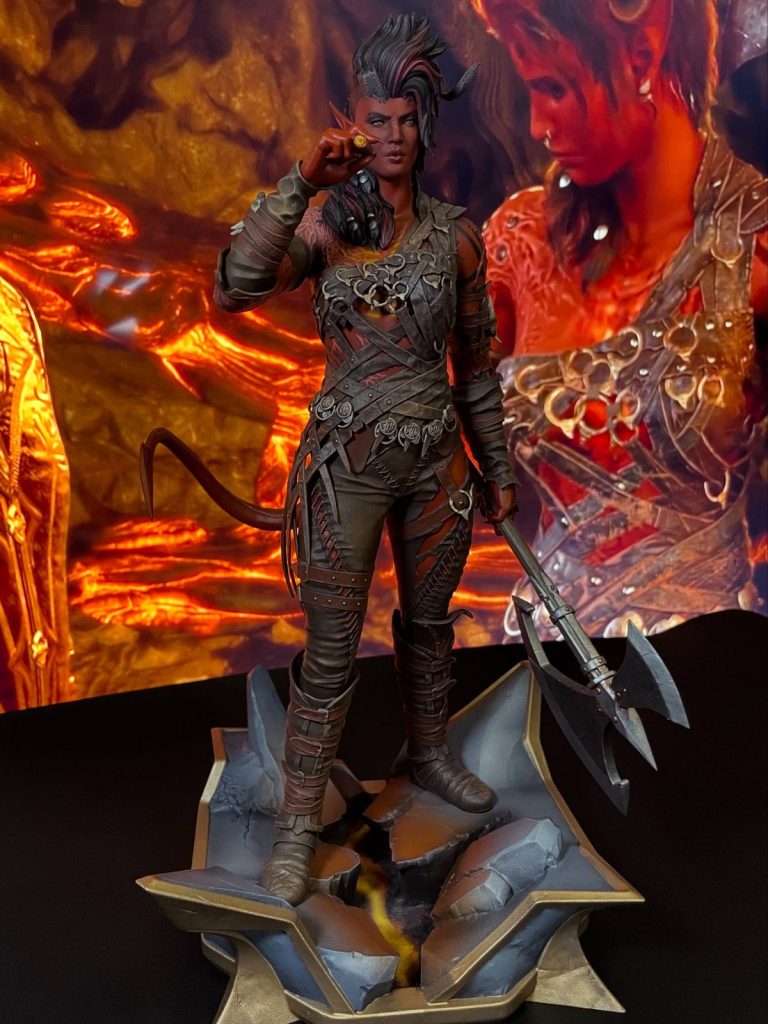 Hand-painted statue inspired by Karlach from Baldur's Gate 3, holding her battle axe, on a cracked base with fire below